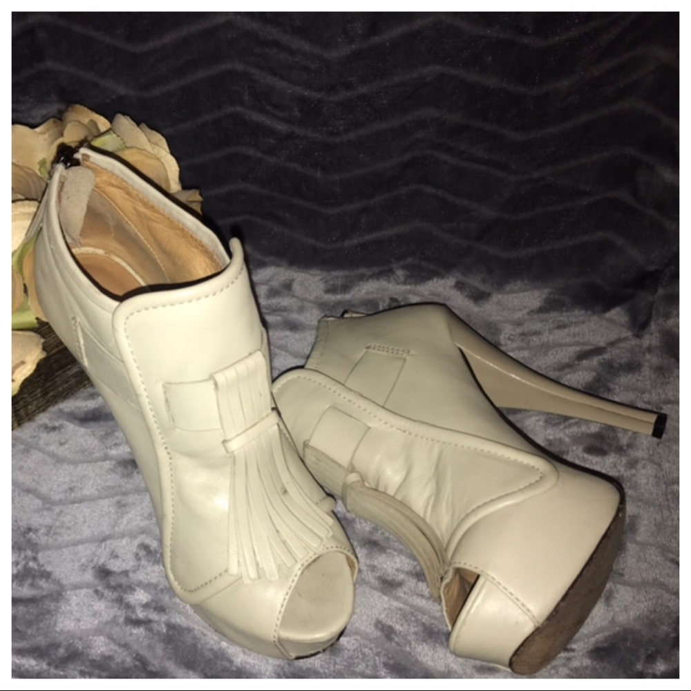 L.A. M.B Nathan Tassel Platform Booties
